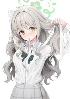 1girl arm_behind_head blue_archive blush bow closed_mouth collared_shirt diagonal-striped_bow green_bow green_halo grey_hair halo highres long_hair looking_at_viewer miyo_(blue_archive) mouth_hold ribbon ribbon_in_mouth shirousagi_una shirt sidelocks skirt solo striped_bow white_shirt white_skirt yellow_eyes