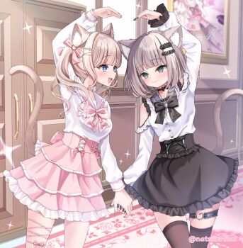 2girls animal_ears arm_up black_bow black_skirt black_thighhighs blonde_hair blue_eyes bow brown_hair cat_ears cat_tail closed_mouth clothing_cutout commentary cowboy_shot frilled_skirt frills green_eyes hair_ornament hairclip highres holding_hands indoors jirai_kei long_hair long_sleeves looking_at_another medium_hair multiple_girls natsuk1tom open_mouth original pink_bow pink_skirt shirt shirt_tucked_in shoulder_cutout skirt smile symbol-only_commentary tail thigh_strap thighhighs twintails white_shirt