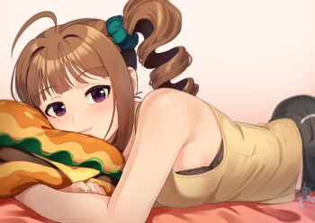 1girl ahoge armpit_peek black_bra black_pants blush bra bra_peek brown_hair burger drill_hair food gradient_background green_scrunchie hugging_object idolmaster idolmaster_million_live! kamille_(vcx68) lying on_stomach pants pillow pillow_hug purple_eyes scrunchie shirt side_drill side_ponytail sidelocks sleeveless sleeveless_shirt smile solo sweatpants underwear yellow_shirt yokoyama_nao