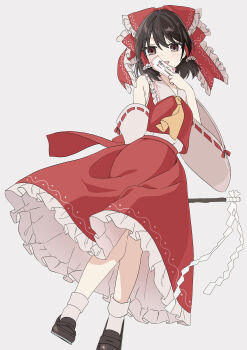 1girl absurdres ascot between_fingers bow brown_eyes brown_hair brown_shoes commentary_request detached_sleeves frilled_bow frilled_hair_tubes frilled_skirt frills full_body gohei hair_bow hair_tubes hakurei_reimu highres holding holding_gohei loafers long_hair looking_at_viewer ofuda ofuda_between_fingers open_mouth red_bow red_skirt ribbon-trimmed_sleeves ribbon_trim shoes simple_background skirt skirt_set smile solo touhou tsuno_no_hito white_background yellow_ascot