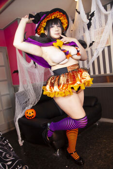 1girl asian black_hair breasts chouzuki_maryou cleavage hat highres large_breasts lipstick makeup photo_(medium) plump solo underboob witch_hat