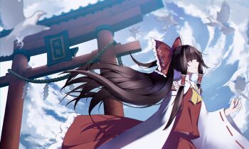 1girl absurdres ascot bird bird_on_hand blue_sky bow brown_hair chinese_commentary cloud commentary day detached_sleeves flying frilled_bow frilled_hair_tubes frills hair_bow hair_tubes hakurei_reimu hazy_(artist) highres long_hair open_mouth outdoors red_bow red_eyes red_skirt ribbon-trimmed_sleeves ribbon_trim shadow skirt skirt_set sky solo torii touhou very_long_hair white_bird yellow_ascot