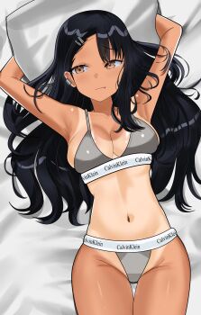 1girl asymmetrical_bangs bed black_hair bra breasts calvin_klein earclip fang hair_ornament hairclip hakucho293 head_on_pillow highres ijiranaide_nagatoro-san long_hair lying medium_breasts nagatoro_hayase on_back on_bed one-piece_tan panties pillow skin_fang tan tanline underwear