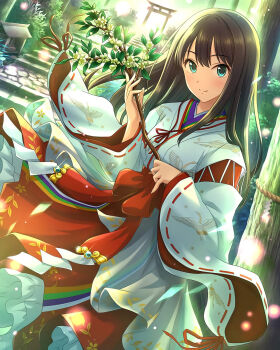 1girl black_hair blush breasts day green_eyes highres holding idolmaster idolmaster_cinderella_girls japanese_clothes long_hair looking_at_viewer medium_breasts miko outdoors shibuya_rin shrine solo standing sunlight torii