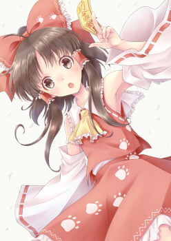1girl armpits ascot bare_shoulders between_fingers bow brown_eyes brown_hair collar commentary_request cowboy_shot detached_sleeves frilled_ascot frilled_bow frilled_collar frilled_hair_tubes frills hair_bow hair_tubes hakurei_reimu hand_up highres holding komiru light_blush long_hair looking_at_viewer ofuda ofuda_between_fingers open_mouth paw_print paw_print_pattern ponytail red_bow red_skirt red_vest shirt skirt solo touhou vest white_shirt white_sleeves yellow_ascot yellow_background