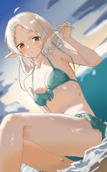 1girl absurdres ahoge beach bikini blue_sky breasts cloud cloudy_sky commentary_request elf eyes_visible_through_hair green_bikini highres looking_at_viewer medium_breasts medium_hair mushoku_tensei navel ocean open_mouth playing_with_own_hair pointy_ears red_eyes rkgktomato sitting sky solo swept_bangs swimsuit sylphiette_(mushoku_tensei) thighs white_hair