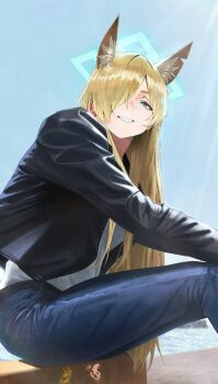 1girl alternate_costume animal_ear_fluff animal_ears black_jacket blonde_hair blue_archive blue_eyes blue_halo denim dog_ears dog_girl grin hair_over_one_eye halo highres jacket jeans kanna_(blue_archive) leather leather_jacket long_hair ocean pants sharp_teeth shirt sitting smile solo su-102 teeth very_long_hair white_shirt