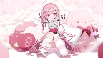 1girl amatsuka_eru animal_hood arrow_through_heart artist_request asymmetrical_legwear blurry depth_of_field hair_ornament hairclip heart heart-shaped_pillow highres hood hood_up indie_virtual_youtuber looking_at_viewer nail_polish open_mouth pajamas pillow pink_hair rabbit_hood red_eyes second-party_source sitting solo striped_clothes striped_thighhighs stuffed_animal stuffed_rabbit stuffed_toy thighhighs uneven_legwear virtual_youtuber
