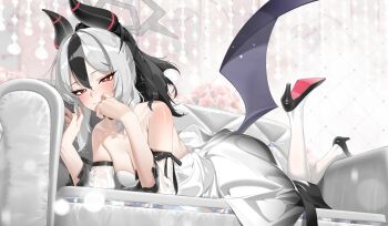 1girl alternate_costume bare_shoulders black_hair black_shoes blue_archive blush breasts cleavage closed_mouth commentary couch demon_girl demon_horns demon_wings detached_sleeves grey_halo hair_between_eyes halo high_heels highres horns karasu-san_(syh3iua83) kayoko_(blue_archive) looking_at_viewer lying multicolored_hair on_couch on_stomach pantyhose red_eyes shoes single_wing solo two-tone_hair white_hair white_pantyhose wings