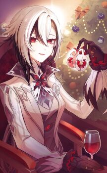 1girl arlecchino_(genshin_impact) black_eyes black_hair christmas_tree coat colored_extremities commentary_request cup drinking_glass fingernails freminet_(genshin_impact) frilled_sleeves frills genshin_impact hair_between_eyes high_collar highres holding_ornament jacket lipstick long_fingernails makeup multicolored_hair ponytail red_pupils symbol-shaped_pupils two-tone_hair upper_body white_hair white_jacket wine_glass x-shaped_pupils ymdm0826