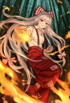 1girl bamboo bamboo_forest bow clenched_hand collared_shirt fighting_stance fire foreshortening forest fujiwara_no_mokou grey_hair hair_bow highres leg_up long_hair looking_at_viewer multiple_hair_bows nature ofuda ofuda_on_clothes outdoors pants parted_lips pyrokinesis red_eyes red_pants red_shoes shirt shoes short_sleeves sidelocks solo standing standing_on_one_leg suspenders torn_clothes torn_sleeves touhou two-tone_bow very_long_hair white_shirt yorigamiyuri