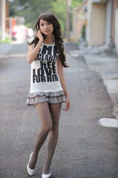 1girl absurdres asian asiangirl5832 brown_hair female_focus headband high_heels highres long_hair looking_at_viewer model outdoors pantyhose photo_(medium) shirt skirt solo white_shirt