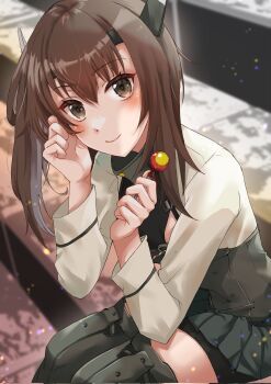 1girl armor bike_shorts black_shorts breastplate brown_eyes brown_hair candy food grey_skirt grey_thighhighs headband headgear highres kanmiya_shinobu kantai_collection lollipop looking_at_viewer pleated_skirt shirt short_hair short_hair_with_long_locks shorts shorts_under_skirt skirt smile solo taihou_(kancolle) taihou_kai_(kancolle) thighhighs white_shirt