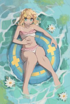 1boy absurdres afloat alternate_costume androgyne_symbol barefoot bikini bikini_tan blonde_hair blush bridget_(guilty_gear) commentary english_commentary feathers flower frilled_bikini frills green_eyes guilty_gear guilty_gear_strive hair_ornament hairclip highres inflatable_raft knees_together_feet_apart legs looking_at_viewer lotus_leaf male_focus medium_hair nail_polish navel pink_nails pool relaxing smile soaking_feet swimming swimsuit tan tanline toenail_polish toenails toes togekk0 trap water water_lily_flower white_feathers