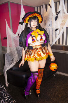 1girl asian black_hair breasts chouzuki_maryou cleavage hat highres large_breasts lipstick makeup photo_(medium) plump solo underboob witch_hat