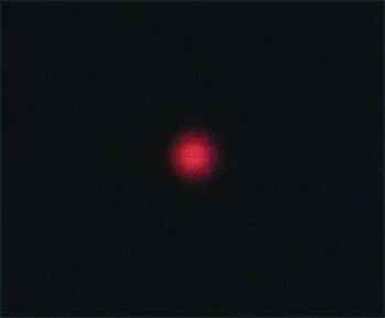 1990s_(style) 1boy animated animated_gif black_gloves choujin_gakuen_gowcaizer ear_piercing energy_sword fingerless_gloves fire gloves holding holding_sword holding_weapon lowres oobari_masami outdoors pants piercing pink_hair retro_artstyle shigure_kyosuke shirt summoning sword weapon white_pants white_shirt