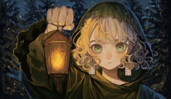 1girl blonde_hair blush closed_mouth commentary_request earrings green_eyes green_hood highres holding holding_lantern jewelry lantern looking_at_viewer original outdoors sayoko_(sayosny2) solo tree