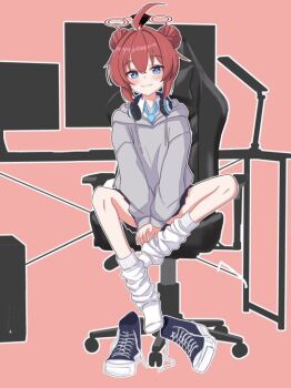 1girl ahoge black_skirt blue_archive blue_eyes blue_necktie blue_shoes blush chair closed_mouth collared_shirt commentary_request computer double_bun full_body gaming_chair grey_hoodie hair_bun halo headphones headphones_around_neck highres hood hood_down hoodie kain501i long_sleeves loose_socks maki_(blue_archive) medium_hair miniskirt monitor necktie on_chair outline pink_background pleated_skirt puffy_long_sleeves puffy_sleeves red_hair red_halo shirt shoes simple_background sitting skirt smile sneakers socks solo swivel_chair unworn_shoes v_arms white_outline white_shirt white_socks