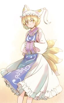 1girl blonde_hair blue_tabard commentary_request dress feet_out_of_frame fox_girl fox_tail frilled_dress frills hat hat_tassel light_blush long_sleeves mob_cap multiple_tails one-hour_drawing_challenge own_hands_together rangycrow short_hair sideways_glance smile solo tabard tail touhou white_dress white_hat yakumo_ran yellow_background yellow_eyes