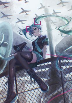 114_usamaro 1girl absurdres aqua_eyes aqua_hair b-52_stratofortress black_shirt black_shoes black_thighhighs chain-link_fence fence gloves hatsune_miku highres holding holding_megaphone koi_wa_sensou_(vocaloid) long_hair megaphone necktie shirt shoes short_sleeves sitting_on_fence solo thighhighs twintails vocaloid
