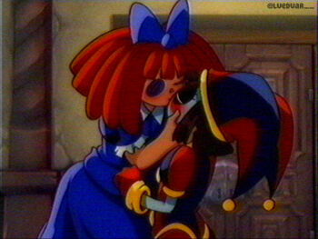1990s_(style) 2girls blue_bow blue_dress blush_stickers bow brown_hair button_eyes buttons closed_eyes commentary cowboy_shot dress english_commentary hair_bow hands_on_another&#039;s_face hat height_difference indoors jester jester_cap kiss lueduar medium_hair multiple_girls pomni_(the_amazing_digital_circus) ragatha_(the_amazing_digital_circus) red_hair retro_artstyle short_hair standing the_amazing_digital_circus twitter_username vhs_artifacts yuri