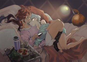 2girls ahoge bare_legs barefoot bed cellphone commentary couple cuddling grey_hair gundam gundam_suisei_no_majo haro holding holding_phone hug lamp looking_at_another mak_(kainemaru) miorine_rembran multiple_girls phone red_hair short_shorts shorts smartphone suletta_mercury toeless_socks tomato tray yuri