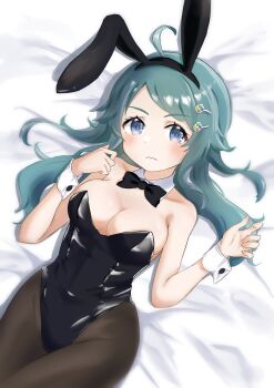 1girl animal_ears black_bow black_leotard blue_eyes bow bowtie breasts cleavage detached_collar fake_animal_ears hair_ornament highres inohara_koboshi kinakollll large_breasts leotard long_hair looking_at_viewer lying ongeki pantyhose playboy_bunny rabbit_ears sakurajima_mai solo strapless strapless_leotard wrist_cuffs