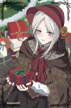 1girl bloodborne blue_eyes blush box brown_cloak christmas_tree christmas_ornaments cloak dress fingerless_gloves flower gift gift_box gloves grey_dress hat hat_flower highres holding holding_gift looking_at_viewer mature_female plain_doll red_gloves red_hat red_lips red_ribbon ribbon signature solo susukeya white_hair white_sleeves