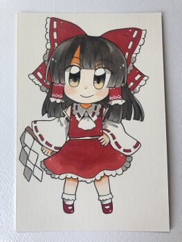 Rule 34 | 1girl, ascot, bad id, bad twitter id, black hair, bow, brown eyes, chibi, chibi only, commentary, detached sleeves, frilled bow, frilled hair tubes, frilled skirt, frills, full body, hair bow, hair tubes, hakurei reimu, hand on own hip, highres, maa (forsythia1729), photo (medium), red bow, red shoes, red skirt, ribbon-trimmed sleeves, ribbon trim, shoes, skirt, skirt set, socks, solo, touhou, traditional media, white ascot, white socks