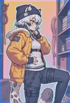 1girl animal_ear_fluff animal_ears arknights beanie black_gloves blue_border blue_eyes blurry blurry_background blush border breasts buttons caffichai cliffheart_(arknights) closed_mouth commentary cowboy_shot ears_through_headwear english_commentary fingerless_gloves from_side fur_trim gloves grey_hair hat highres jacket long_hair multicolored_hair outline shelf solo tail two-tone_hair white_hair white_outline yellow_background yellow_jacket