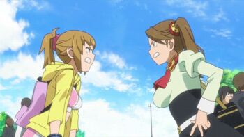 10s 2girls animated animated_gif blonde_hair breasts brown_hair gundam gundam_build_fighters gundam_build_fighters_try hoshino_fumina large_breasts lowres multiple_girls ponytail profile sazaki_kaoruko short_hair twintails