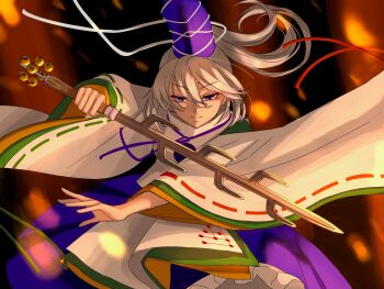 1girl aoiueo12 blue_eyes blue_hat blue_skirt blurry blurry_background closed_mouth commentary_request frilled_skirt frills grey_hair hat highres holding holding_weapon japanese_clothes kariginu long_hair long_sleeves looking_at_viewer mononobe_no_futo ponytail ribbon-trimmed_sleeves ribbon_trim skirt solo tate_eboshi touhou weapon wide_sleeves