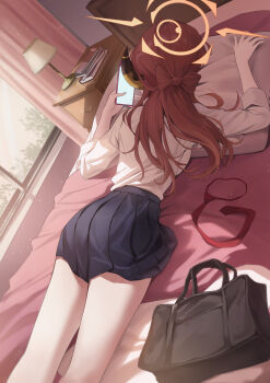 1girl absurdres aru_(blue_archive) bag black_bag black_skirt blue_archive bow-shaped_hair cellphone commentary dated_commentary demon_horns dutch_angle halo highres holding holding_phone horns indoors lying miniskirt necktie okkimon on_bed on_stomach phone pink_hair pleated_skirt school_bag school_uniform shirt skirt smartphone solo unworn_necktie white_shirt