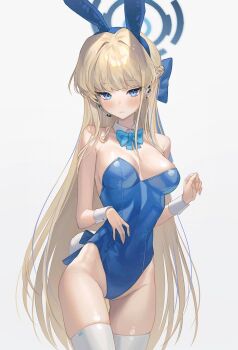 1girl animal_ears bare_arms bare_shoulders blonde_hair blue_archive blue_eyes blue_hairband blue_leotard bow bowtie braid breasts closed_mouth cowboy_shot detached_collar earpiece fake_animal_ears fake_tail fymrie hairband halo highleg highleg_leotard highres leotard long_hair looking_at_viewer medium_breasts official_alternate_costume playboy_bunny rabbit_ears rabbit_tail simple_background solo standing strapless strapless_leotard tail thigh_gap thighhighs thighs toki_(blue_archive) toki_(bunny)_(blue_archive) very_long_hair white_background white_thighhighs wrist_cuffs
