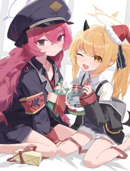 2girls ;d absurdres armband black_coat black_hat black_horns black_wings blonde_hair blue_archive blush box christmas christmas_present closed_mouth coat collared_shirt commentary demon_horns demon_wings dress english_commentary fang5hine gift gift_box grey_eyes halo hat highres holding holding_gift horns ibuki_(blue_archive) iroha_(blue_archive) jacket long_hair long_sleeves looking_at_viewer military_jacket multiple_girls necktie one_eye_closed open_mouth peaked_cap pointy_ears purple_halo red_armband red_hair red_necktie ribbon santa_hat shirt side_ponytail sitting smile wariza white_shirt wings yellow_eyes yellow_halo