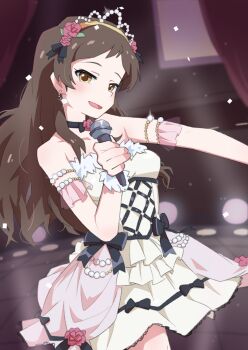 1girl armlet bare_shoulders black_choker blush breasts brown_eyes brown_hair choker collarbone commentary_request cowboy_shot dress flower flower_choker frilled_dress frills hair_flower hair_ornament headband highres holding holding_microphone idol idolmaster idolmaster_million_live! jewelry kitazawa_shiho kitazawa_shiho_(princess_story) long_hair looking_at_viewer microphone ohgi910 open_mouth smile solo stage stage_lights standing strapless strapless_dress