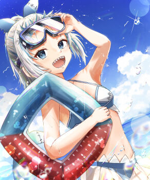 1girl bikini blue_bikini blue_eyes blue_sky blue_streaks breasts cloud commentary_request fins fish_tail gawr_gura goggles goggles_on_head grey_hair highres holding holding_swim_ring hololive hololive_english innertube looking_at_viewer medium_hair navel open_mouth outdoors ponytail shark_girl shark_tail sharp_teeth sky small_breasts solo swim_ring swimsuit tail teeth u_da_desu virtual_youtuber water