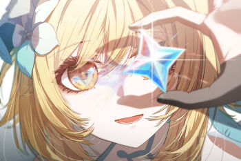1girl absurdres black_gloves blonde_hair bu_bai_(wres2744) close-up commentary_request eye_reflection flower gem genshin_impact glint gloves hair_flower hair_ornament highres holding holding_gem looking_at_object lower_teeth_only lumine_(genshin_impact) open_mouth partially_fingerless_gloves portrait primogem reflection smile solo teeth yellow_eyes