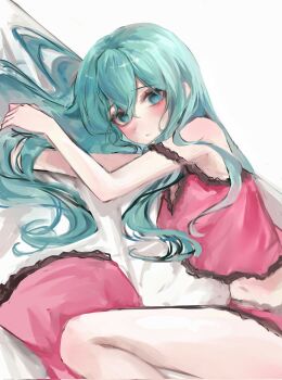 1girl aqua_eyes aqua_hair bare_arms bare_shoulders bed_sheet black_lace_trim blush breasts camisole commentary_request dutch_angle hair_between_eyes hair_down hatsune_miku highres lace-trimmed_camisole lace_trim long_hair lying medium_breasts midriff n_kiring navel on_bed on_side pink_camisole pink_pillow romeo_to_cinderella_(vocaloid) solo strap_slip vocaloid