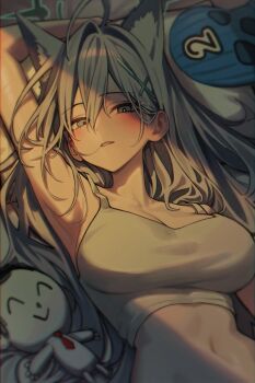 1girl absurdres ahoge animal_ear_fluff animal_ears arm_up balaclava blue_archive blue_eyes blue_halo blush breasts character_doll commentary crop_top cross cross_hair_ornament doll extra_ears grey_hair hair_between_eyes hair_ornament halo highres inverted_cross kin_(wdng_25) large_breasts long_hair looking_at_viewer lying mask mismatched_pupils navel on_back on_bed parted_lips shiroko_terror_(blue_archive) shirt solo unworn_mask upper_body white_shirt wolf_ears wolf_girl