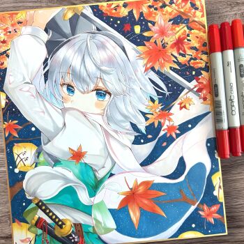 1girl art_tools_in_frame autumn_leaves black_hairband blue_eyes blush commentary_request falling_leaves green_skirt green_vest grey_hair hairband highres hitodama holding holding_sword holding_weapon juliet_sleeves katana konpaku_youmu konpaku_youmu_(ghost) leaf long_sleeves looking_at_viewer photoshop_(medium) puffy_sleeves ringo33757 scarf sheath sheathed shikishi shirt skirt skirt_set solo sword touhou traditional_media unsheathed vest weapon white_scarf white_shirt