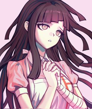 1girl apron bandaged_arm bandaged_hand bandages brown_eyes brown_hair cyacyacyacyaki danganronpa_(series) danganronpa_2:_goodbye_despair highres long_hair own_hands_clasped own_hands_together parted_lips pink_shirt puffy_short_sleeves puffy_sleeves shirt short_sleeves solo teeth tsumiki_mikan upper_body white_apron