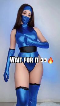 1girl alternate_costume animated argentine_(nationality) bare_shoulders black_boots black_hair blue_eyes blue_gloves blue_leotard boots breasts comparison cosplay english_text gloves hairband hand_on_own_chest headband highleg highleg_leotard highleg_one-piece_swimsuit highres instagram kitana kitana_(cosplay) leotard leotard_pull long_hair mask medium_breasts mortal_kombat_(cosplay) mortal_kombat_(series) mouth_mask narrow_waist official_alternate_costume one-piece_swimsuit pelvic_curtain photo_(medium) pulling_own_clothes real_life revealing_clothes shiny_clothes simple_background sophie_valentine sound standing swimsuit tagme thigh_boots thong thong_leotard thong_one-piece_swimsuit video