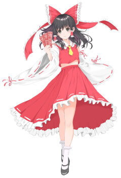 1girl ascot black_shoes bow brown_eyes brown_hair closed_mouth commentary_request detached_sleeves frilled_bow frilled_hair_tubes frilled_skirt frills full_body hair_bow hair_tubes hakurei_reimu highres holding holding_ofuda long_hair looking_at_viewer misato24 ofuda red_bow red_nails red_skirt ribbon-trimmed_skirt ribbon-trimmed_sleeves ribbon_trim shoes simple_background skirt skirt_set socks solo touhou white_background white_socks yellow_ascot