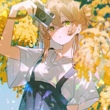 1girl ashima_(roro046) blonde_hair blue_nails blurry blush camera collar depth_of_field double_bun earrings hair_between_eyes hair_bun holding holding_camera jewelry looking_at_viewer medium_hair nail_polish necklace open_mouth original outdoors overall_skirt shirt short_sleeves solo tree white_shirt yellow_eyes