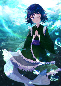 1girl :d absurdres blue_eyes blue_hair blush bubble commentary fins fish_tail frilled_kimono frills green_kimono head_fins highres japanese_clothes kimono light_rays long_sleeves looking_at_viewer nettian51 obi one_eye_closed open_mouth own_hands_together ribbon sash scales short_hair smile solo tail touhou underwater wakasagihime wide_sleeves yellow_ribbon