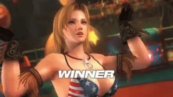 1girl american_flag american_flag_bikini american_flag_print belt bikini bikini_top_only blonde_hair breasts brown_belt brown_gloves cleavage dead_or_alive dead_or_alive_5 denim flag_print flag_print_bikini game_screenshot gloves jeans jewelry navel pants pendant print_bikini swimsuit tina_armstrong