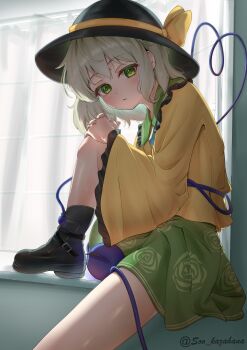 1girl absurdres backlighting black_boots black_hat blush boots bow buttons closed_mouth commentary curtains diamond_button eyelashes floral_print floral_print_skirt foot_out_of_frame frilled_shirt_collar frilled_sleeves frills from_side frown green_eyes green_hair hair_bow hat heart heart_of_string highres hugging_own_legs indoors interlocked_fingers knee_up komeiji_koishi long_sleeves looking_at_viewer medium_hair miniskirt own_hands_together print_skirt rose_print shirt sitting skirt solo soo_kazahana sun_hat third_eye touhou twitter_username wide_sleeves window yellow_bow yellow_shirt