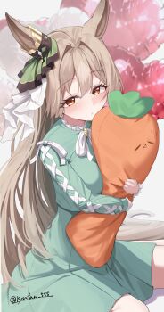 1girl animal_ears bow breasts brown_hair carrot-shaped_pillow commentary_request ear_ribbon green_ribbon highres holding holding_pillow horse_ears horse_girl horse_tail long_hair looking_at_viewer lryutanl medium_breasts pillow ribbon satono_diamond_(casual)_(umamusume) satono_diamond_(umamusume) sitting solo tail twitter_username umamusume