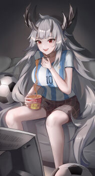 1girl absurdres ahoge argentina argentinian_flag argentinian_flag_print arknights ball bare_legs breasts breasts_squeezed_together couch crt fangs flag_print food grey_hair highres horns indoors instant_noodles large_breasts long_hair matoimaru_(arknights) multiple_horns on_couch open_mouth pointy_ears red_eyes shirt short_sleeves shorts sitting smile soccer_ball soccer_uniform solo sportswear striped_clothes striped_shirt television vertical-striped_clothes vertical-striped_shirt very_long_hair watching_television wuzhihuijia